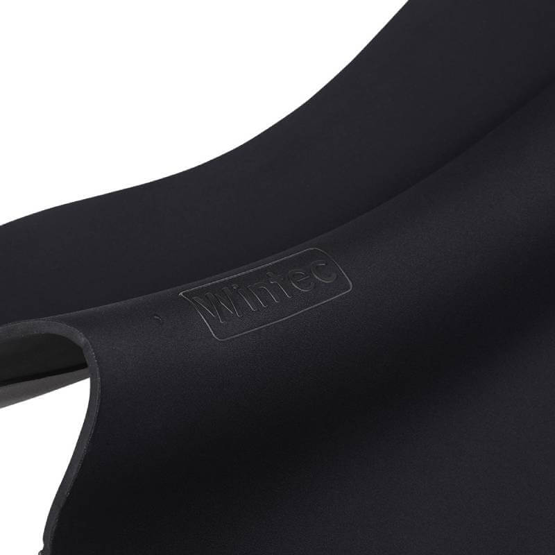 Close-up of Wintec Riser Comfort Pad Jump Black shows embossed brand name and saddle clearance.