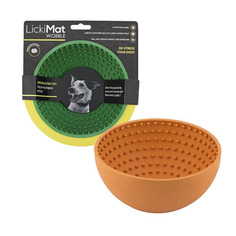 Two LickiMat Wobble bowls: one green in packaging, one orange out, both by LickiMat.