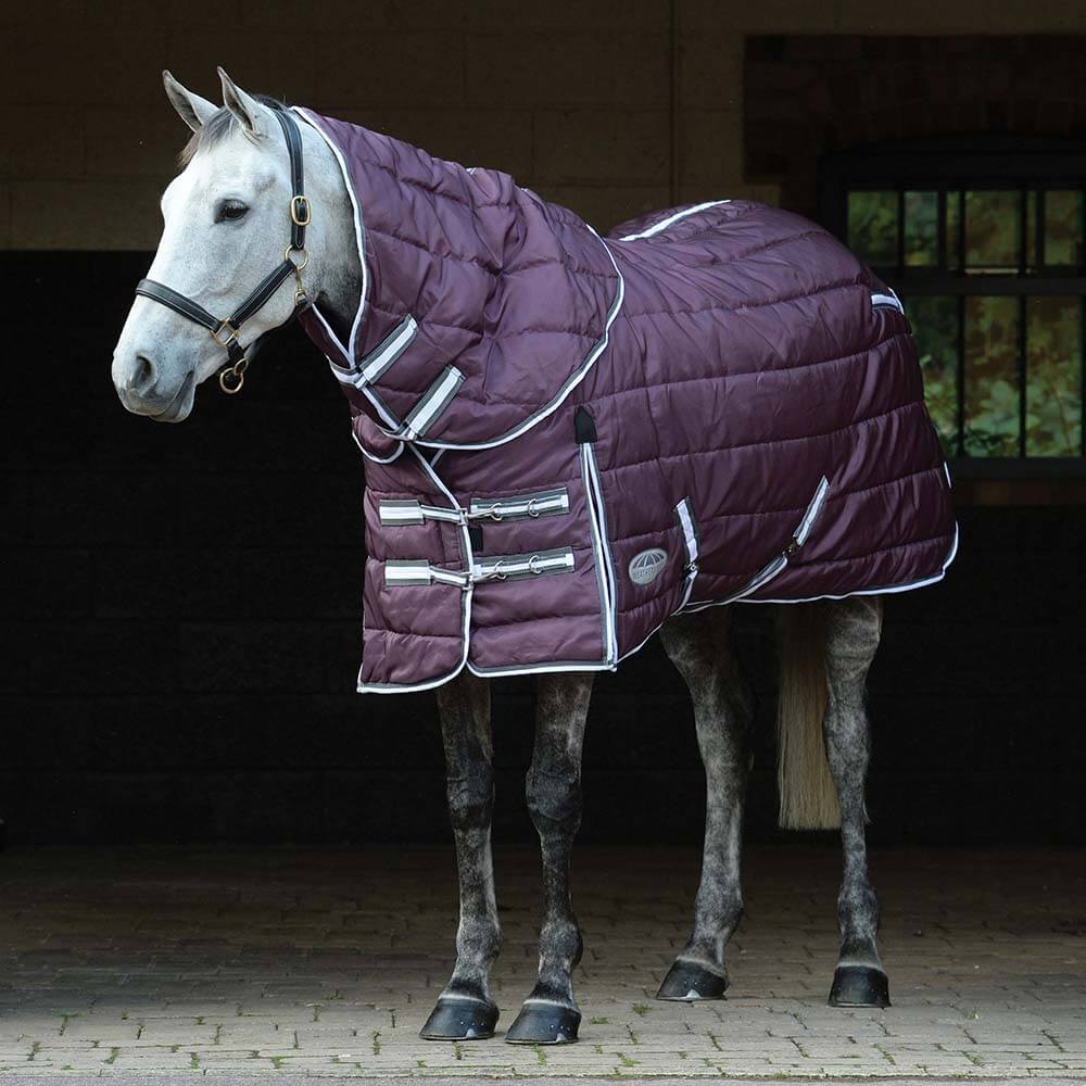 Grey horse in a maroon Weatherbeeta Comfitec PP Channel Quilt II Detach-A-Neck stable rug.