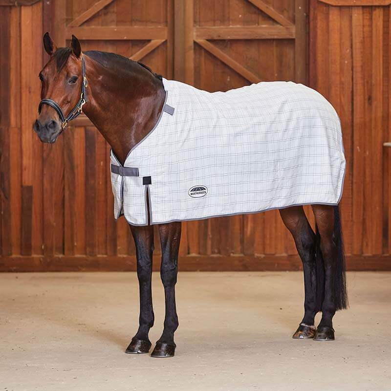 Brown horse in stable wears Weatherbeeta Comfitec Cotton Sheet Liner White/Grey.