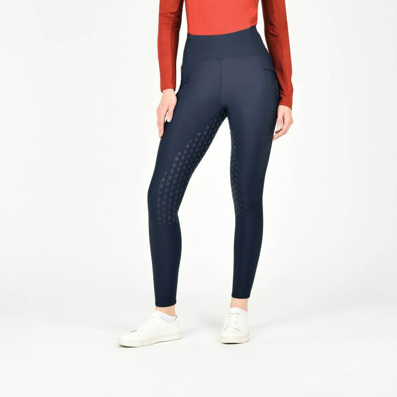 Woman in a red long-sleeve top and Weatherbeeta Thermal Riding Tights Sky Captain Ladies.