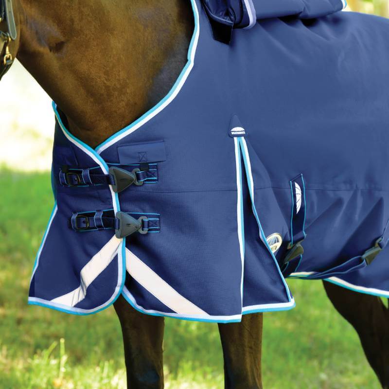 Dark horse wears a Weatherbeeta Comfitec Ultra Hardi Detach-A-Neck blanket outside.