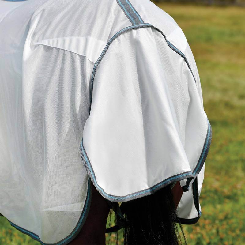 A close-up of a horse in a Weatherbeeta Comfitec Essential Mesh II Combo in a grassy field.