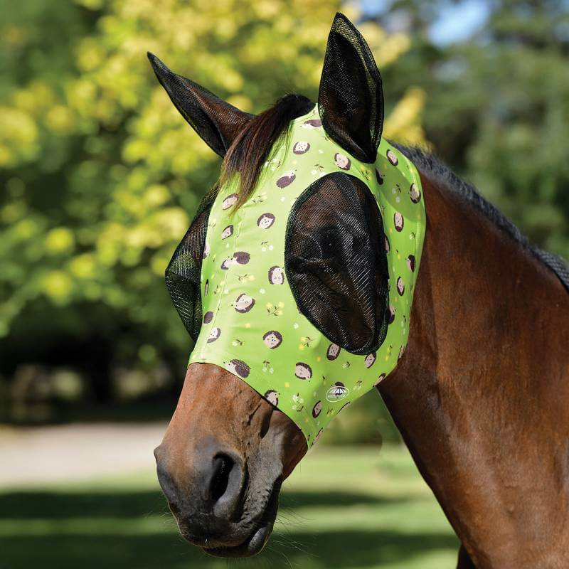 Brown horse wearing Weatherbeeta Deluxe Stretch Bug Eye Saver with ears, hedgehogs &amp; flowers print.
