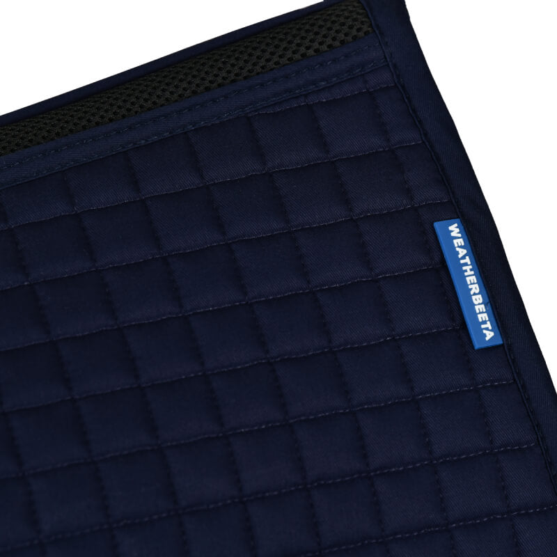 Weatherbeeta Prime Air-Tec All Purpose Saddle Pad in navy with black edge and blue label.