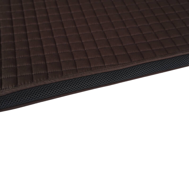 Close-up of a Weatherbeeta Prime Air-Tec Dressage Saddle Pad in chocolate with mesh trim.