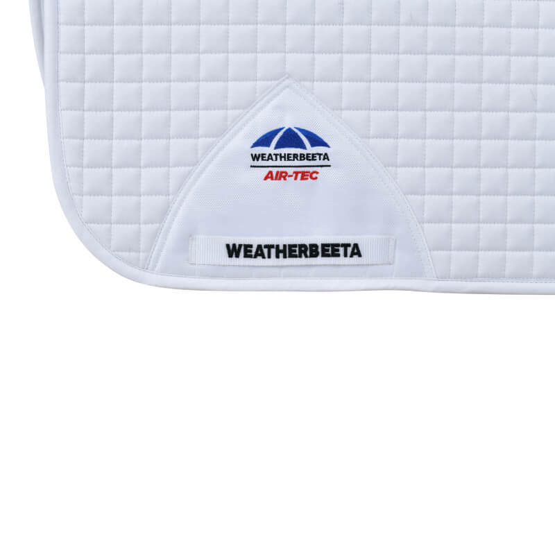White, breathable Weatherbeeta Prime Air-Tec Dressage Saddle Pad with corner label.