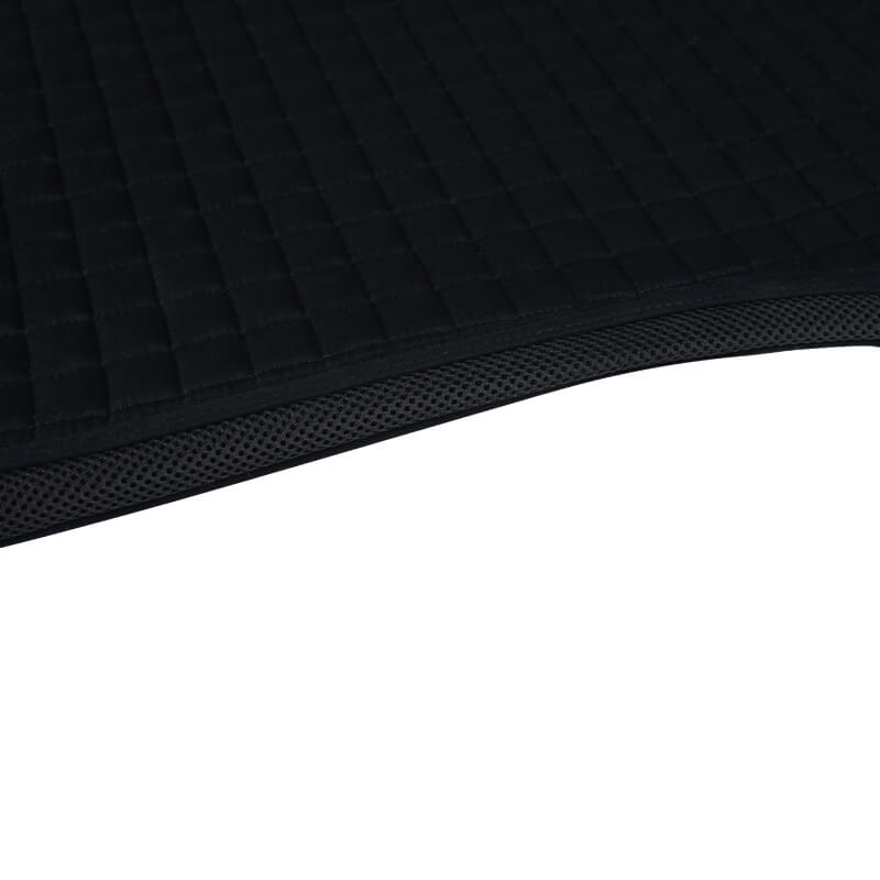 Close-up of the Weatherbeeta Prime Air-Tec Jump Shaped Saddle Pad in black with mesh trim.