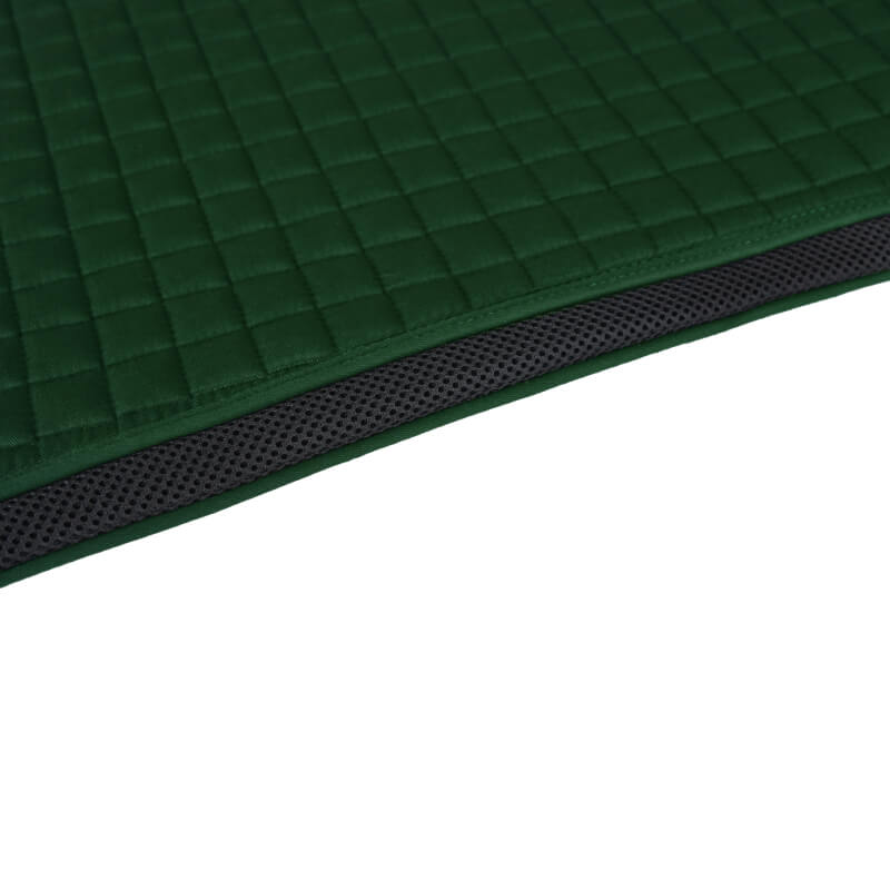 Close-up of Weatherbeeta Prime Air-Tec Jump Saddle Pad in Forest Green with black mesh edge.