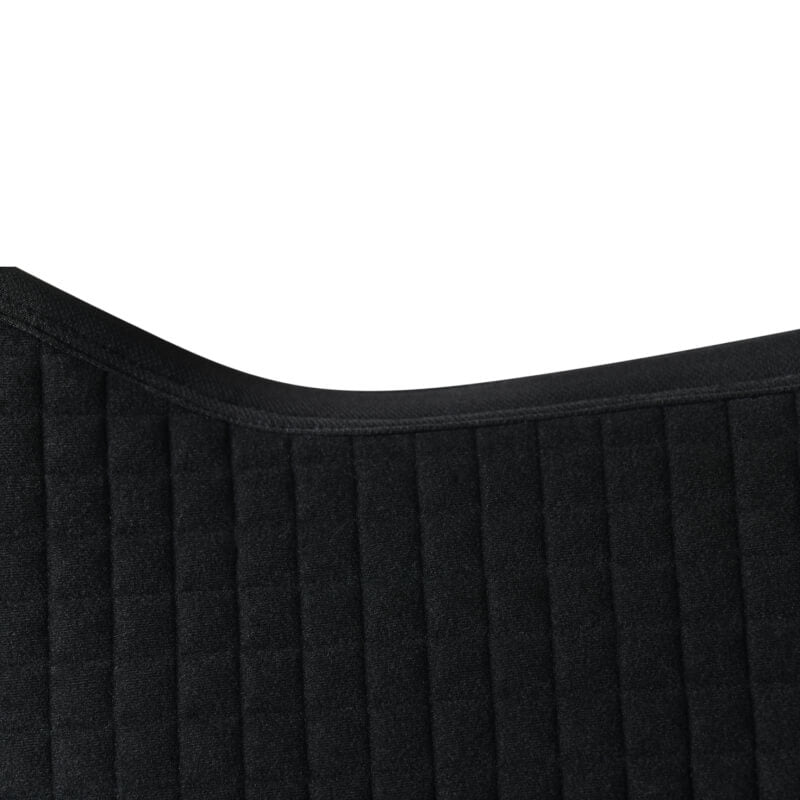 Close-up of a forest green Weatherbeeta Prime Air-Tec jump saddle pad with quilted stitching.