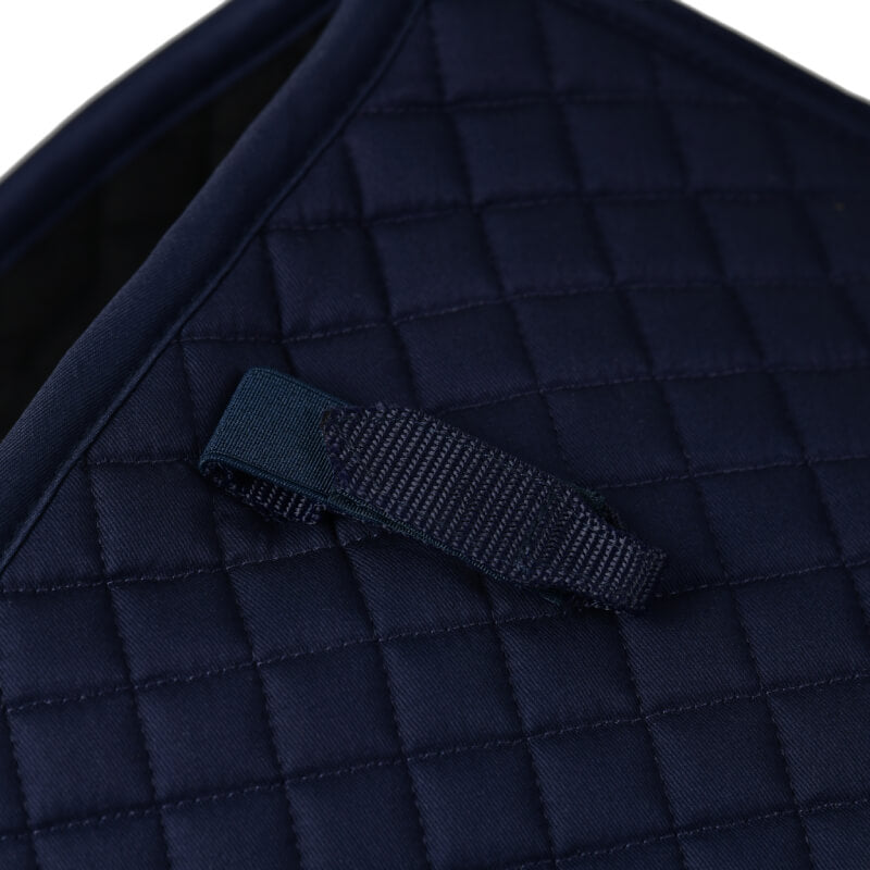 Close-up of a Weatherbeeta Prime Air-Tec Jump Shaped Saddle Pad in navy with loop handle.