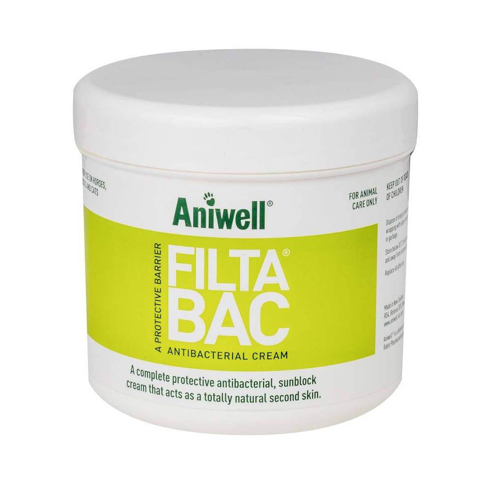 White tub of Aniwell Filtabac antibacterial skin protection cream for pets with green label.