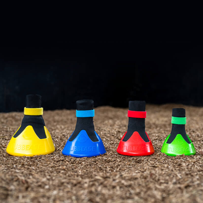 Shoof Tubbease Hoof Sock by Shoof for hoof soaking, in yellow, blue, red, and green.
