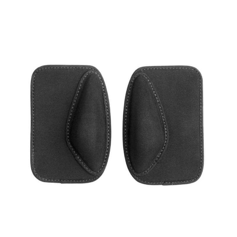 Two black Wintec Flexibloc Pair - Jump Rear pads with raised, curved sections and visible stitching.