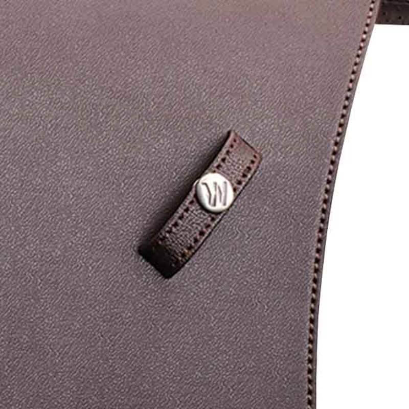 Close-up of the Wintec Stirrup Keeper Brown, featuring a small strap and branded detailing.